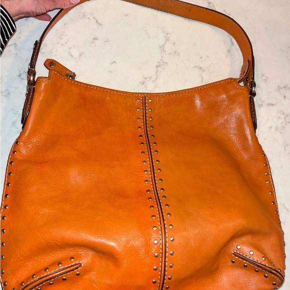 Michael Kors Handbags - Michael Kors Orange Studded Shoulder Bag
